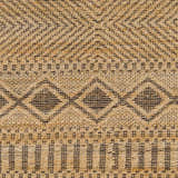 Close-up of the Nasugbu Jute Carpet. Tan jute rug with a black geometric pattern. Hand woven texture. Swatch