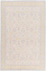 Close-up of the hand-knotted Navarino Area Rug. Traditional design in light beige, dusty pink, and mustard tones. Design-Rectangle-5686