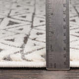 Close up of Naylor Beige/Charcoal Rug showing texture and pile height with a ruler. Farmhouse style rug detail. Pile