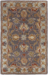 Close-up of the hand-tufted Cherryfield 1004 area rug. Features a traditional floral pattern in beige, burnt orange, and slate blue. Design-Rectangle-23