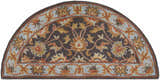 Close-up of the hearth-shaped Cherryfield 1004 rug. Hand-tufted wool rug in beige, burnt orange, and slate blue floral pattern. Design-Hearth