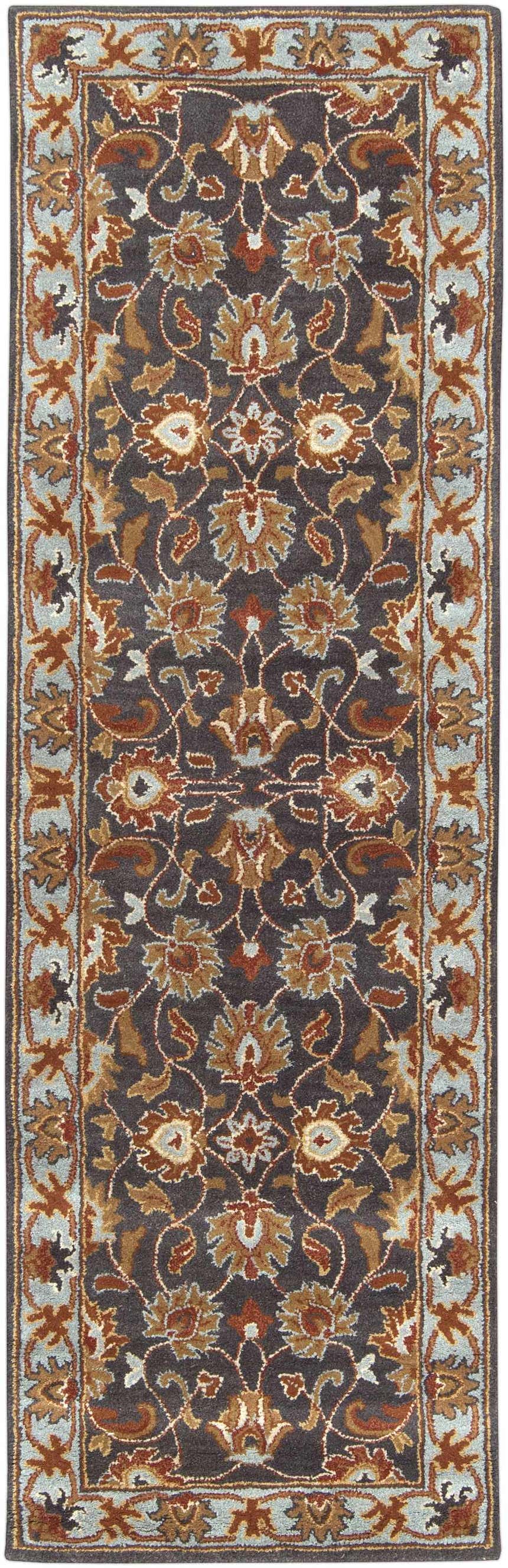 Close-up of the hand-tufted Cherryfield 1004 wool rug. Features a traditional floral pattern in beige, burnt orange, and slate blue. Design-Runner-268