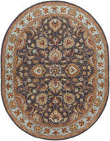 Close-up of the round Cherryfield 1004 rug. Hand-tufted wool rug in beige, burnt orange, charcoal, and ice blue floral pattern. Design-Oval-810