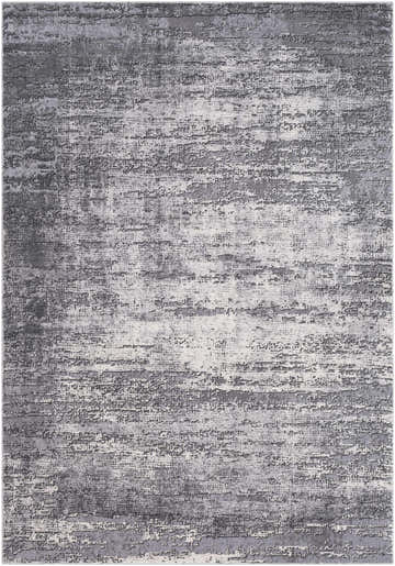 Close-up of the Nesmith Updated Traditional Tibetan Rug; a charcoal, gray, and medium gray rug with a distressed, textured pattern. Design-Rectangle-5376