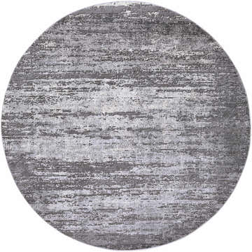 Close-up of a round Nesmith Updated Traditional Tibetan Rug. Charcoal, gray, and medium gray abstract pattern. Design-Round-710