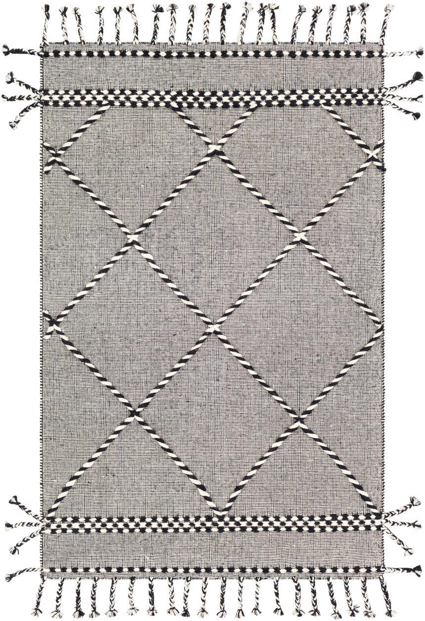 Close-up of the hand woven Ninderry Wool Area Rug. Black and cream rug with diamond pattern and tassels. Bohemian style. Design-Rectangle-576
