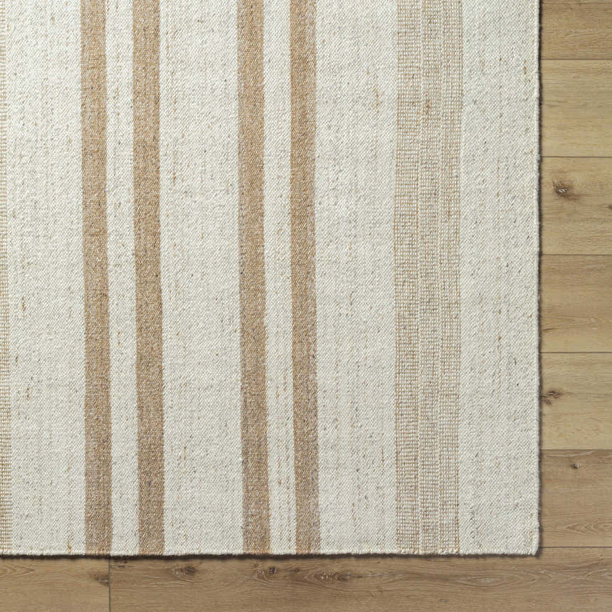 Close-up of the hand woven Nibaw Area Rug. Ash, light silver, sage, and tan stripes on a wool texture. Corner