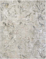 Close-up of the Nurit Sage Thick Luxe Boutique Rug, featuring a southwestern floral pattern in charcoal, cream, and light brown. Design-Rectangle-710103