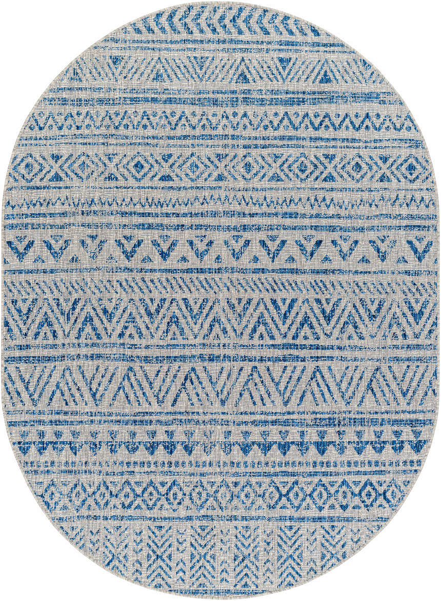 Close-up of the oval Novato All Over Pattern Performance Rug. Features a blue geometric design on a light background. Design-Oval-5373