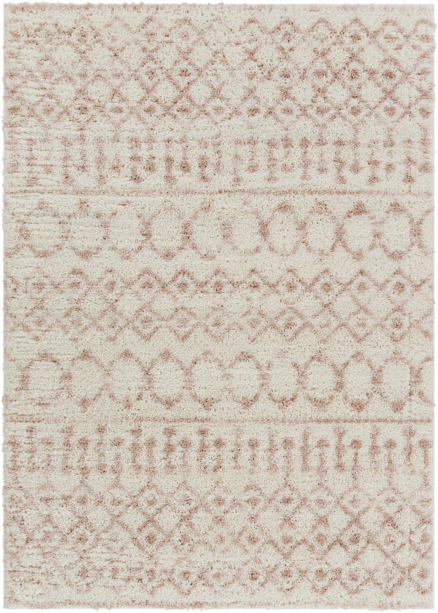 Close-up of the Narrogin Area Rug, a shag rug in cream and blush with a geometric bohemian pattern. Design-Rectangle-5373