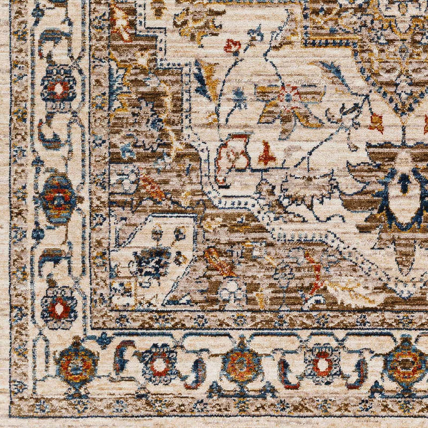 Close-up of the Anas Traditional Style Rug showcasing its beachhouse, clay, and brown floral pattern and soft texture. Swatch