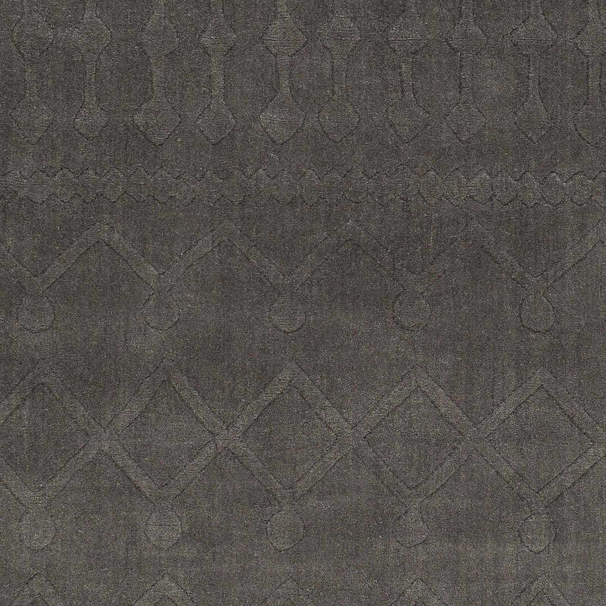 Close-up of the charcoal Newtonhill Clearance Rug. Hand-loomed 100% wool rug with a subtle geometric pattern. Swatch