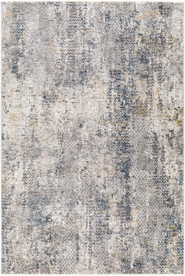 Close-up of the Odell Abstract Luxe Fringe Rug, featuring a distressed geometric pattern in blues, grays, and mustard. Design-Rectangle-575
