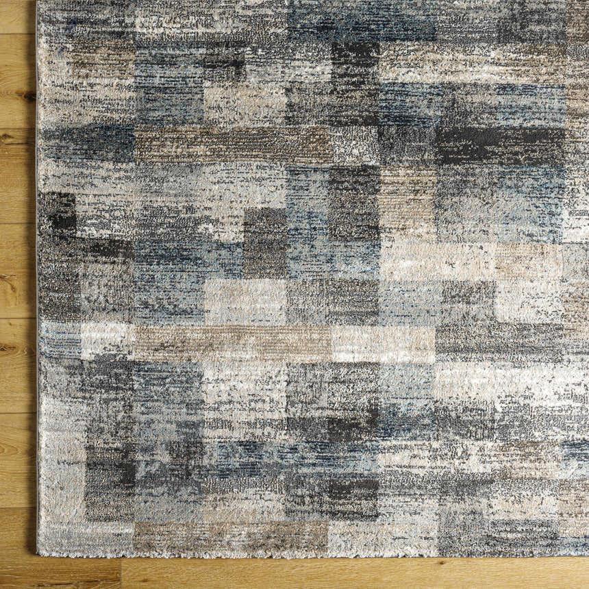 Close-up of the Ohtli Mosaic Luxe Thick Area Rug. Southwestern style with gray, smoke, and mosaic pattern. Swatch