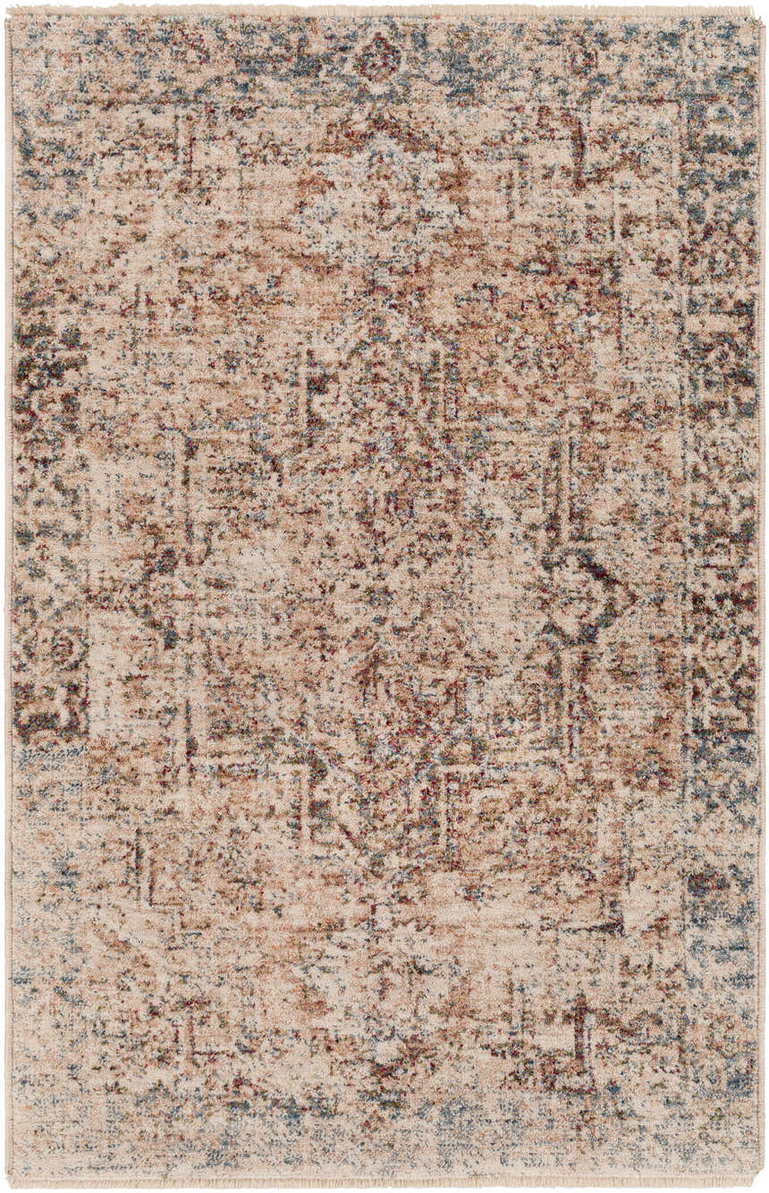 Close-up of the Onley Area Rug. Machine-woven polyester rug in denim, gold, light beige, and navy with a vintage, traditional pattern. Design-Rectangle