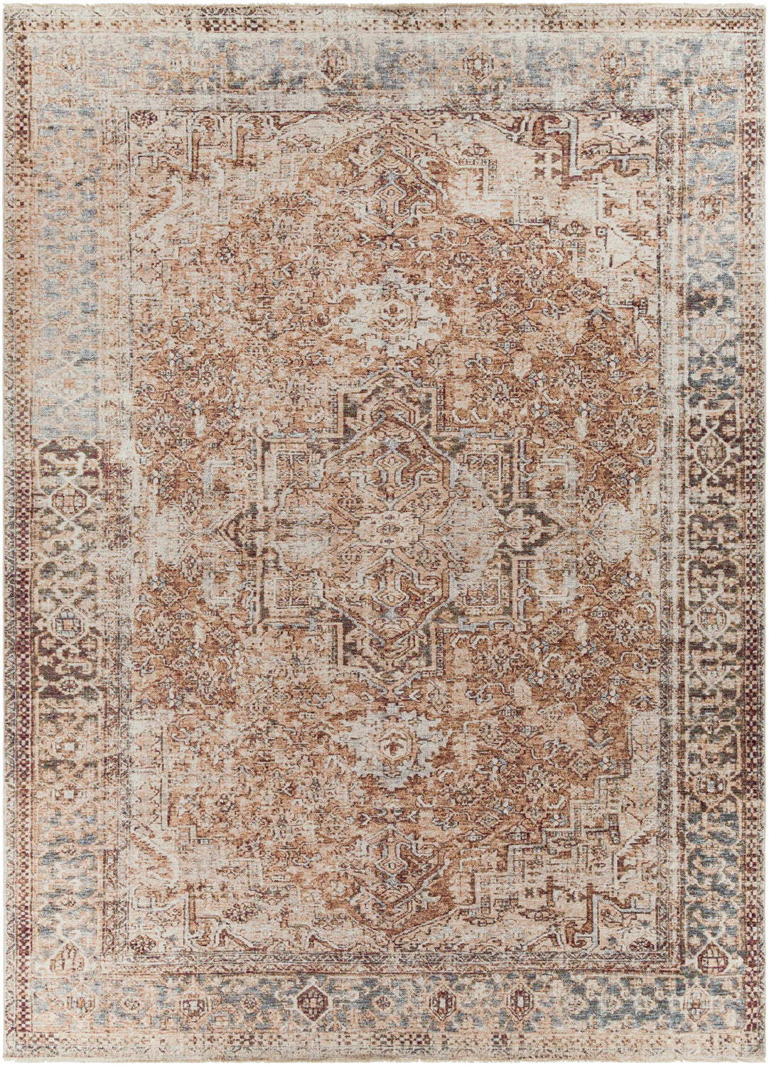 Close-up of the Onley Area Rug, showcasing its traditional, vintage design in denim, gold, beige, and navy. Machine-woven polyester. Design-Rectangle-9131