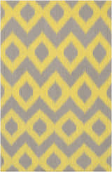 Close-up of the Oradell Yellow Ikat Wool Rug. Features a yellow geometric pattern on a gray background. Hand woven texture. Design-Rectangle-58