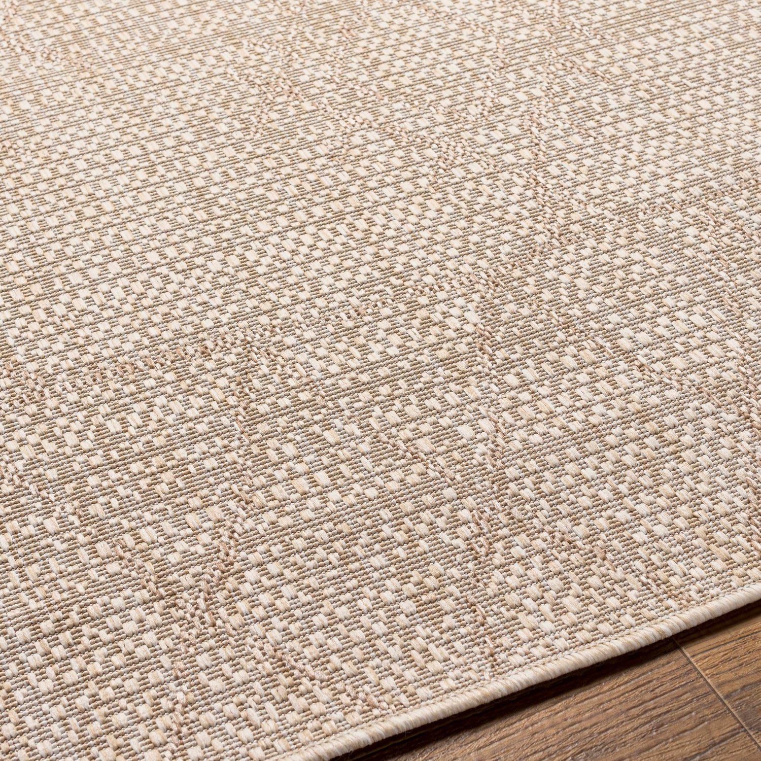 Close-up of the Marwood Brown Nordic Rug showing its woven texture and subtle geometric pattern in cream and light brown. Texture