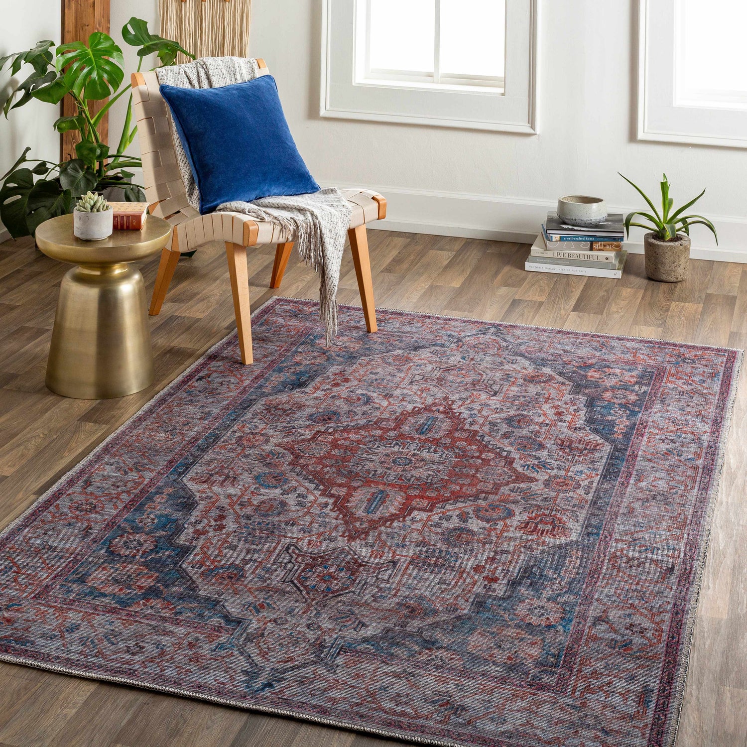 Living room scene with Osmaneli Washable Area Rug in dark gray, purple, and brown oriental pattern. Roomscene-Rectangle