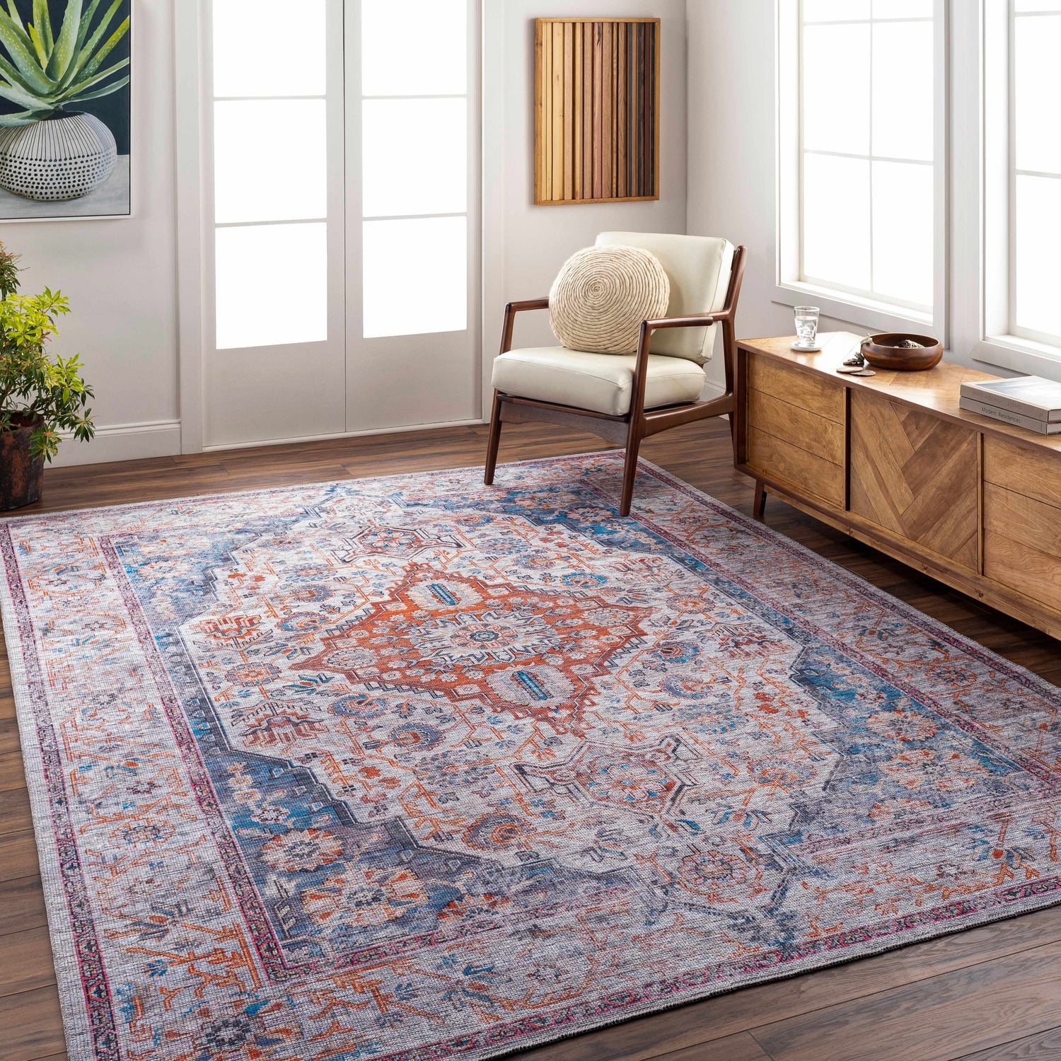 Living room scene with Osmaneli Washable Area Rug in dark gray, purple, and brown. Farmhouse style with wood accents. Roomscene-Rectangle