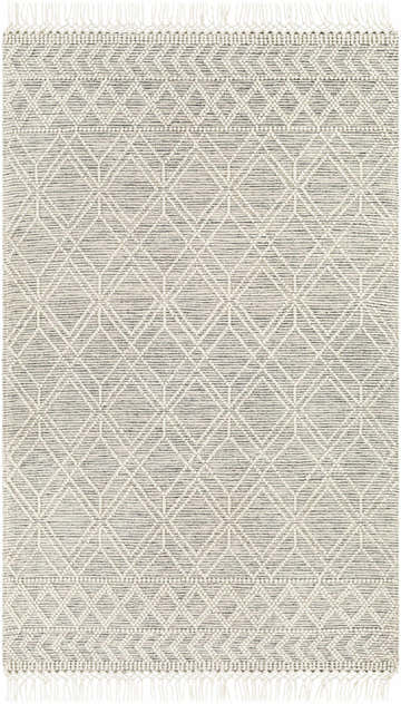 Close-up of the Ossun Wool Rug. Cream geometric pattern on black woven rug with tassels. Farmhouse style. Design-Rectangle-576