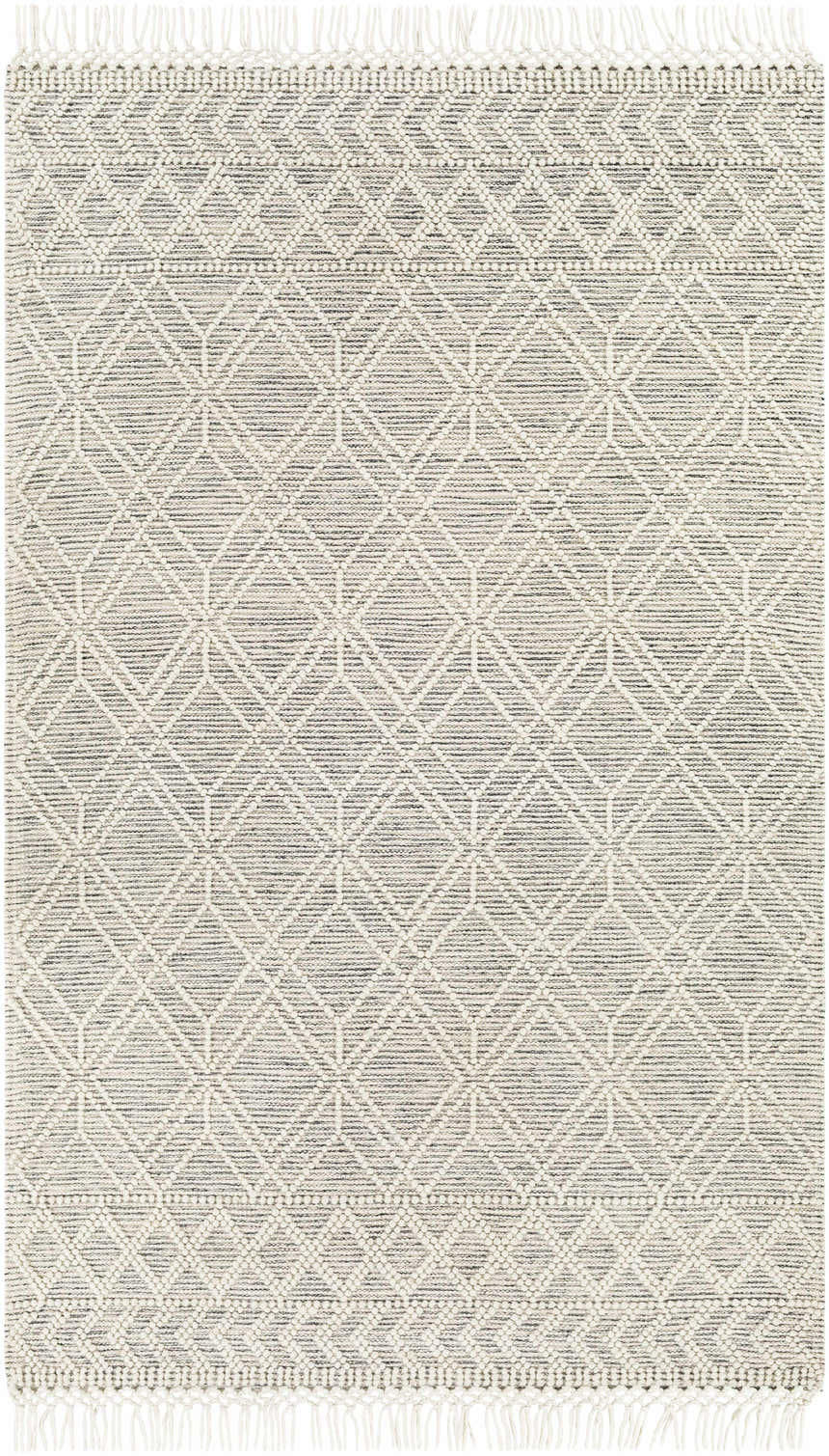 Close-up of the Ossun Wool Rug. Cream geometric pattern on black woven rug with tassels. Farmhouse style. Design-Rectangle-576