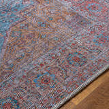Close-up of the Otaki Washable Area Rug showing its traditional, multi-colored pattern and chenille-polyester/cotton texture. Texture