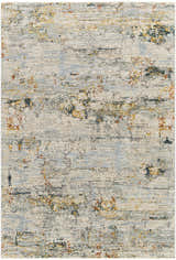 Close-up of the Ottawa Luxe Rug. Contemporary design in cream, blue, tan, and brick red hues. Machine woven polyester texture. Design-Rectangle-575