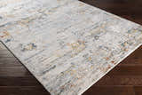 Close-up of the Ottawa Luxe Rug. Contemporary Persian style with brick red, cream, blue, and gray tones. Corner