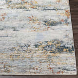 Close-up of the Ottawa Luxe Rug showing its cream, gray, teal, and brick red contemporary Persian-style design. Front