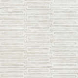 Close up of the Partlow Area Rug. Beige and cream viscose rug with a contemporary geometric pattern. Swatch