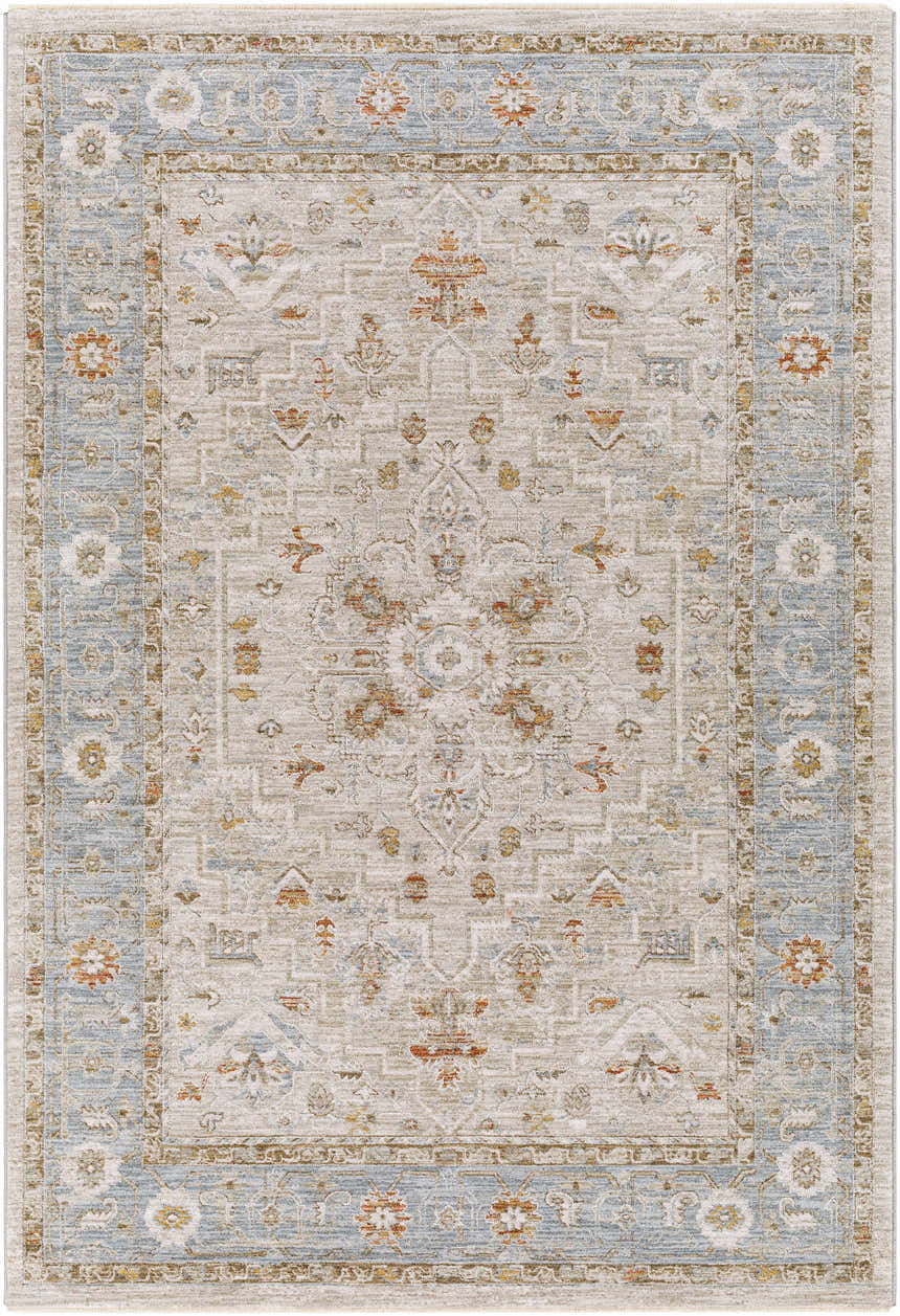 Close-up of the Phyllis Thick Luxe Statement Rug, showcasing traditional patterns in light beige, denim, and brick red hues. Design-Rectangle-575