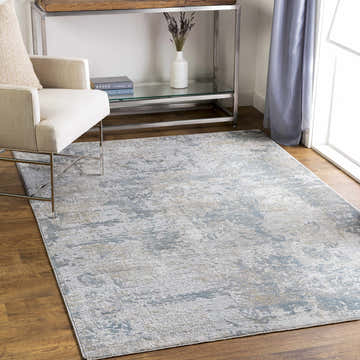 Living room scene with Pialba Thick Luxe Abstract Smokey Rug, beige chair, console table, and blue curtains. Roomscene-Rectangle