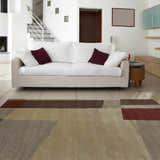 Living room scene with a contemporary Piedra Premium Wool Area Carpet in beachhouse, tan, and walnut colors. Roomscene-Rectangle