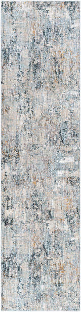 Close-up of the Pinjarra Luxe Rug; a contemporary rug in charcoal, cream, blue, and tan with a distressed abstract design. Design-Runner-2710