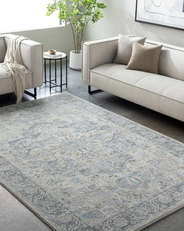 Living room scene with Akshay Light Gray Thick Luxe Area Rug, light sofas, and modern decor. Roomscene-Rectangle