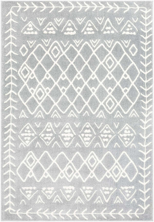 Close-up of the Plumsteadville Area Rug. Cream and slate gray rug with a geometric diamond and arrow pattern. Farmhouse style. Design-Rectangle-5373