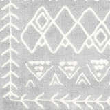 Close-up of the Plumsteadville Area Rug. Cream and slate rug with a geometric farmhouse pattern. Swatch