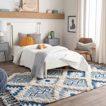 Kids bedroom with white bed and Painesdale Blue/White Wool Carpet. Bohemian style with blue and ivory colors. Roomscene-Rectangle