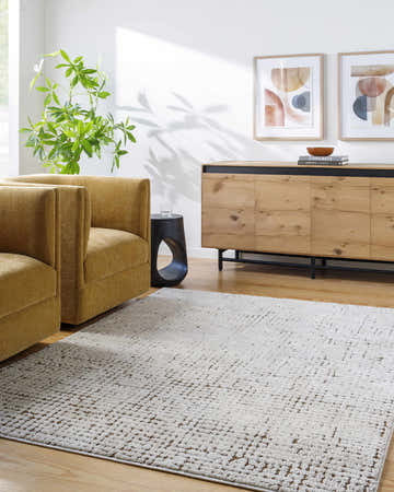 Living room scene with Cascade Minimalist Rug, gold armchairs, and wood cabinet. Contemporary style. Roomscene-Rectangle