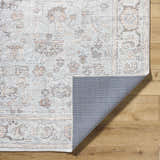 Close-up of Livabliss x Our PNW Home Olympic Damask Light Blue Rug showing the damask pattern, light blue, cream, and brown colors. Fold