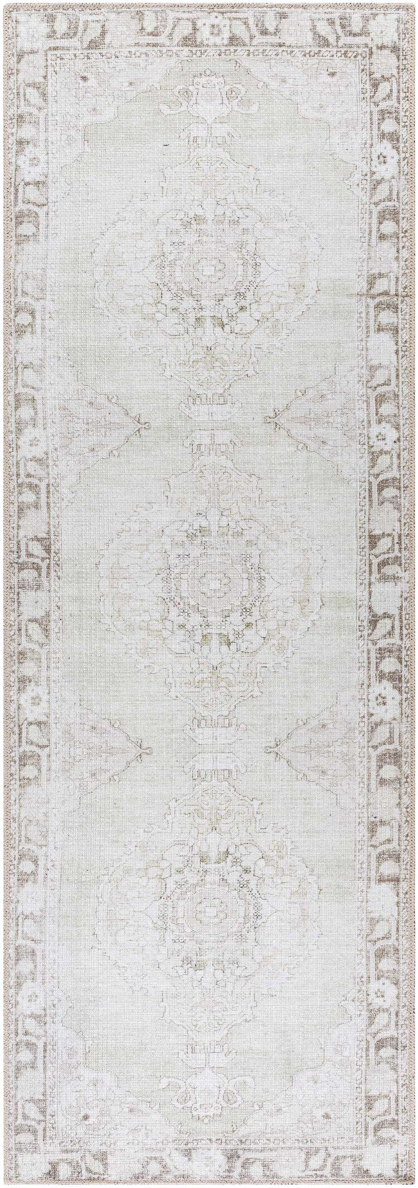 Close-up of Livabliss x Our PNW Home Rainier Medallion Gray Washable Rug. Farmhouse style, medium gray color, medallion pattern. Design-Runner-27710