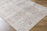 Close-up of the PNW Home Rainier Damask Light Brown Washable Rug showing its traditional pattern and light brown and tan colors. Corner