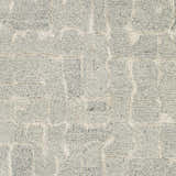 Close-up of the hand-tufted Posof Area Rug. Light beige wool rug with a contemporary light gray, medium gray, and peach block pattern. Swatch
