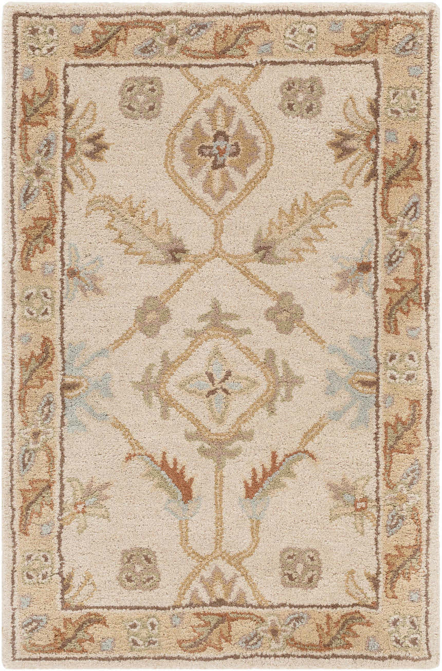 Close-up of the Postelle Wool Rug. Hand-tufted rug with a traditional floral pattern in brown, tan, and dusty sage. Design-Rectangle-23