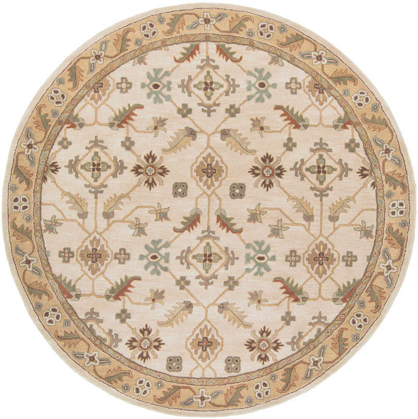 Detailed round Postelle Wool Rug in tan, brown, sage, and red. Hand-tufted with a traditional floral and geometric pattern. Design-Round-8