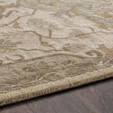 Close up of the Broomfield Hand Tufted Sage 1143 Area Rug showing beige, sage, and brown traditional floral pattern. Texture