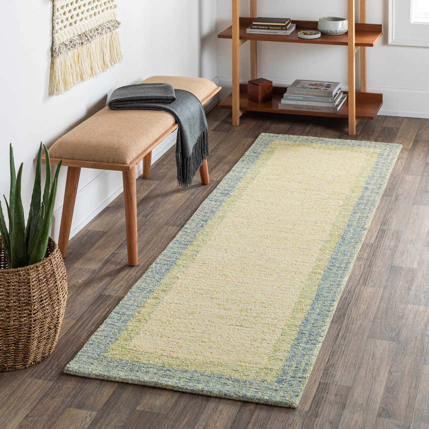 Entryway with a Pualas Area Rug runner in cream, sage, and light beige colors. Bench, shelf, and plant complete the scene. Roomscene-Runner