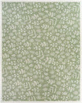 Close-up of the Pulteney Area Rug. Cream botanical pattern on an olive green vinyl rug. Machine woven. Design-Rectangle