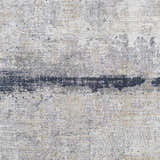 Close-up of the Rainworth Modern Slate Luxe Rug, showcasing its charcoal, gray, beige, and blue contemporary design. Swatch